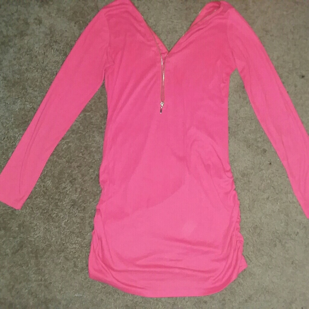 Long sleeved dress , with zippers.